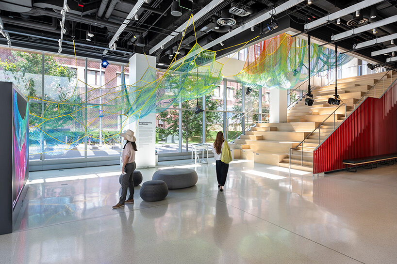 janet echelman suspends lightweight, woven installation within the MIT museum