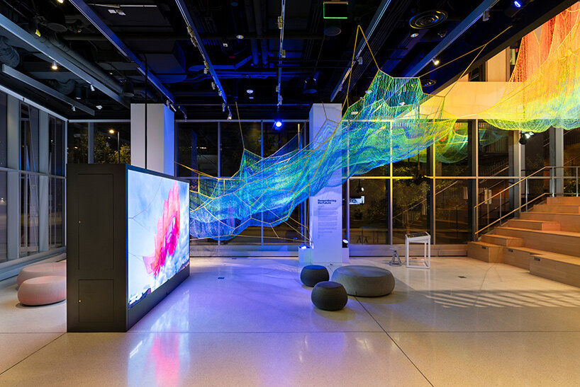 janet echelman suspends lightweight, woven installation within the MIT museum