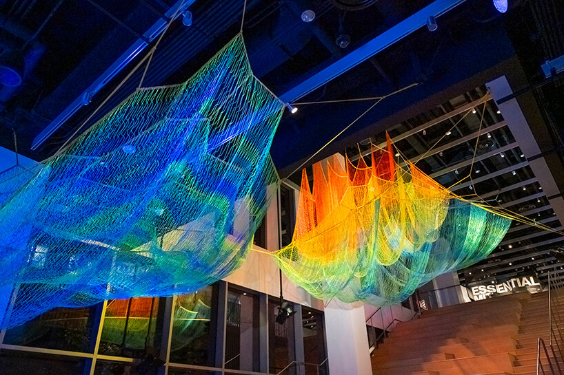 janet echelman suspends lightweight, woven installation within the MIT museum