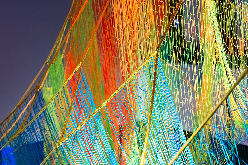 janet echelman suspends lightweight, woven installation within the MIT museum