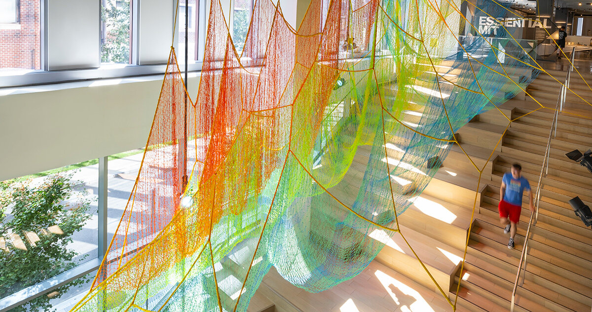 janet echelman suspends woven artwork within the MIT museum