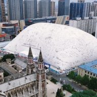 Inflatable dome next to church in Jinan
