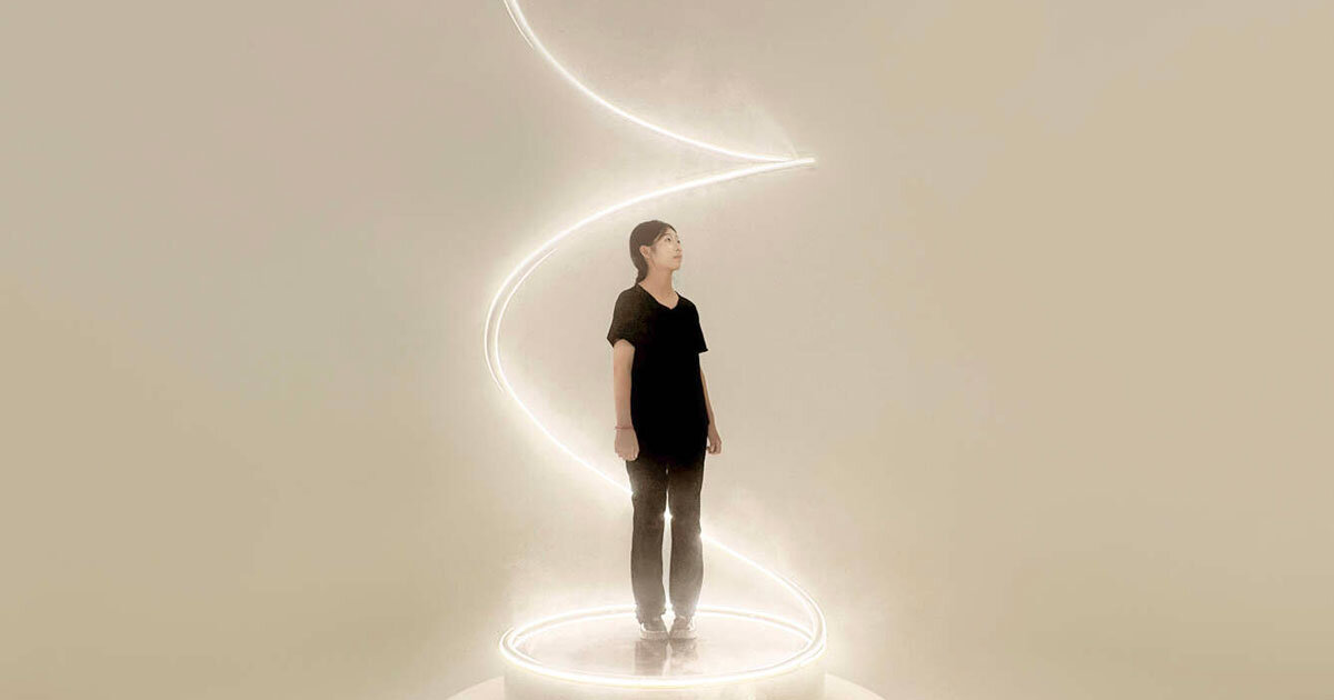 karolina halatek presents spiral installation of mist and light for lancôme
