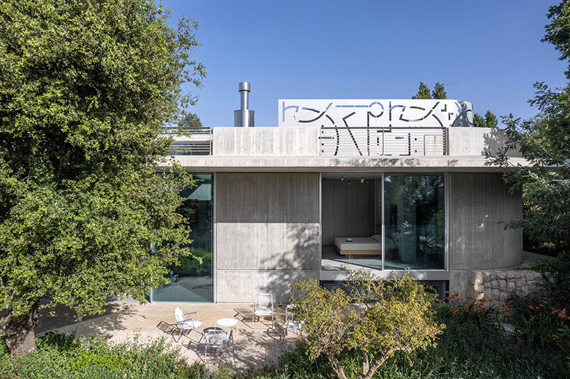 lebanon house by EAST architecture studio doubles as art gallery under sculptural roof
