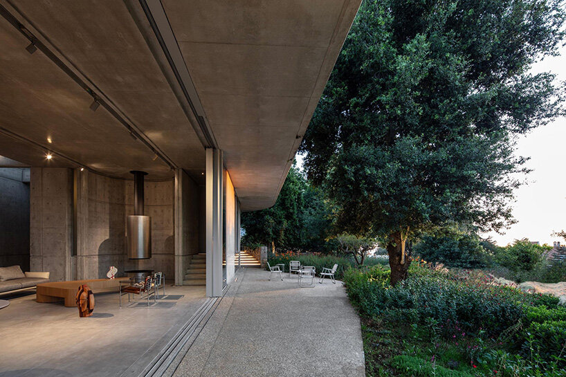 lebanon house by EAST architecture studio doubles as art gallery under sculptural roof