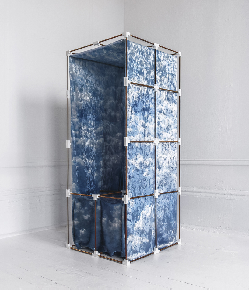 modular brass grid chair draped in velvet replicates coreless exoskeleton skyscrapers