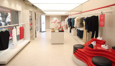 red sculptural elements define ARKS flagship store by anagram architects in mumbai