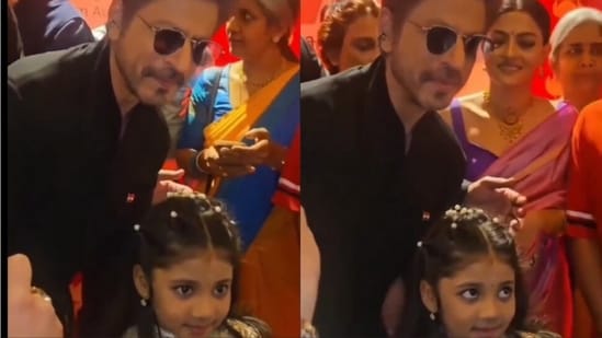 Shah Rukh Khan posed with Treesha Thosar at the event held in Delhi.