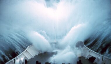 A ship plows through rough seas in the Bering Sea
