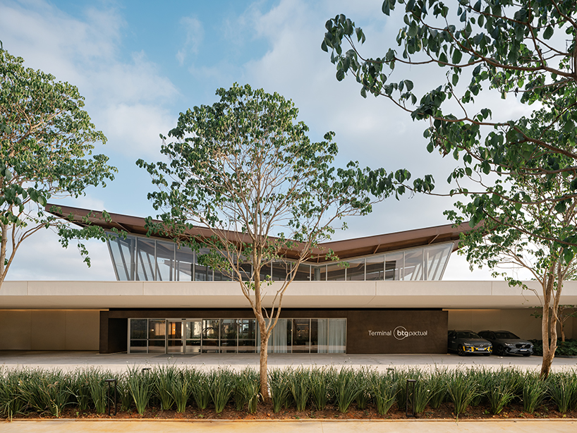 wing roofs shape private airport terminal in são paulo by perkins&will and pascali semerdjian
