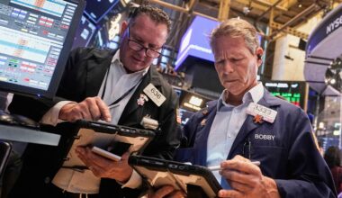 Wall Street coasts toward the end of another winning month