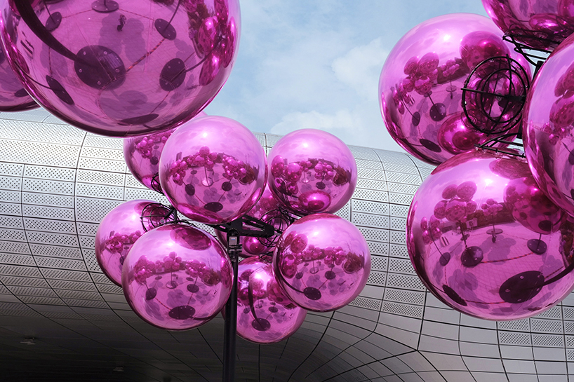 vincent leroy's kinetic cloud sculpture of glossy pink spheres hovers at seoul's design plaza