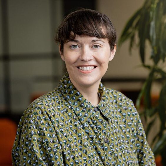 Liz Durst, CEO of Riverlane, smiles.