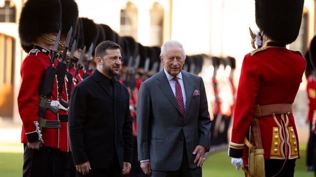Ukrainian President Volodymyr Zelensky, King Charles III and Major Ben Tracey inspect a guard of honour