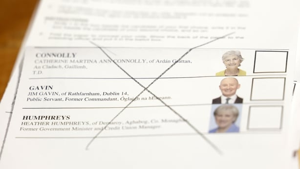 A spoiled ballot paper is pictured showing an 'X' written across all three candidates.