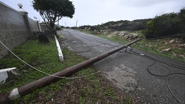 A fallen Jamaica Public Service Company light pole is seen