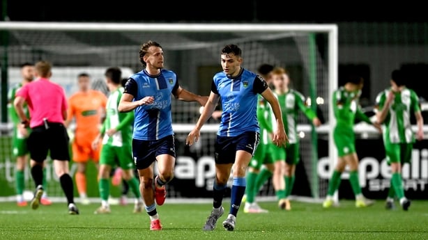 28 October 2025; Brian McManus of UCD, left, celebrates with teammate Eanna Clancy after scoring their side's first goal during the SSE Airtricity Men's First Division Play-Off semi-final second leg match between Bray Wanderers and UCD at Carlisle Grounds in Bray, Wicklow. Photo by Tyler Miller/Spor