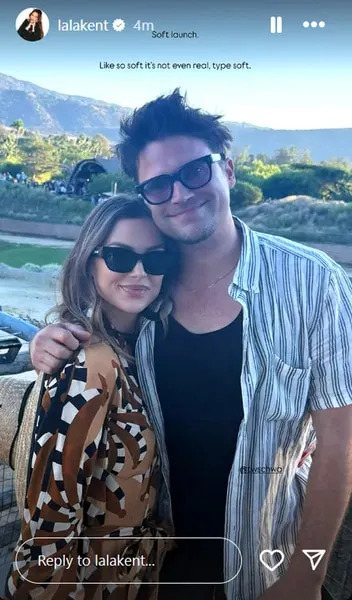 Lala Kent and Tom Schwartz wearing sunglasses and posing for a photo together
