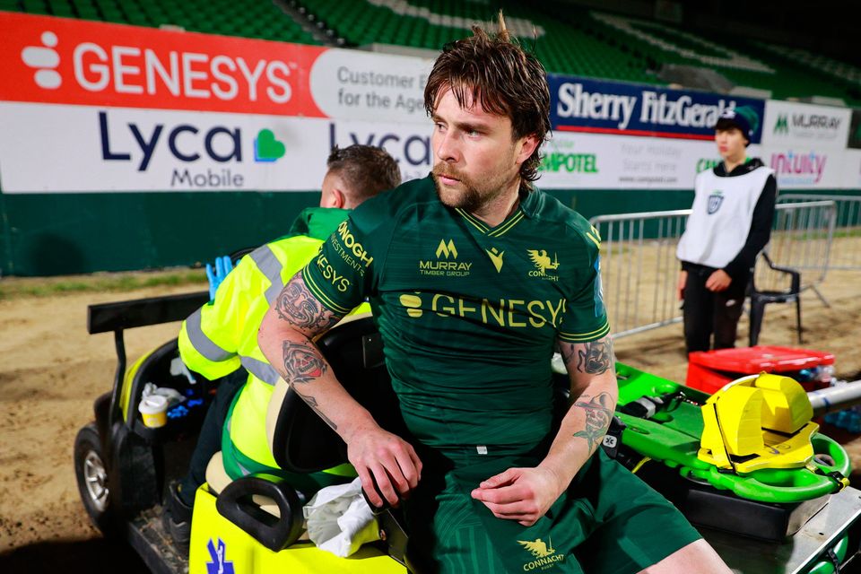 Connacht's Mack Hansen is taken off the pitch after picking up an injury against the Bulls at Dexcom Stadium. Photo: Thomas Flinkow/Sportsfile