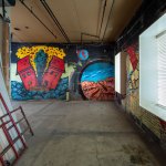Two walls of a building in construction show a mural that had been hidden from view for nearly 40 years.