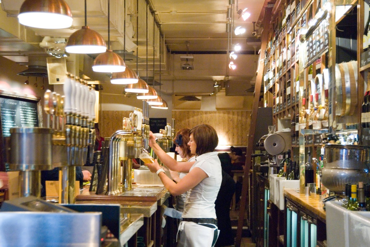 Share of low-paid workers in UK hits record low while gender pay gap narrows