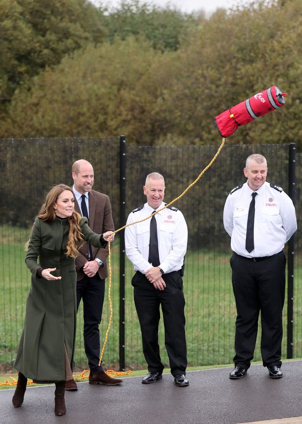 Kate has a go at throwing a float during a drill 