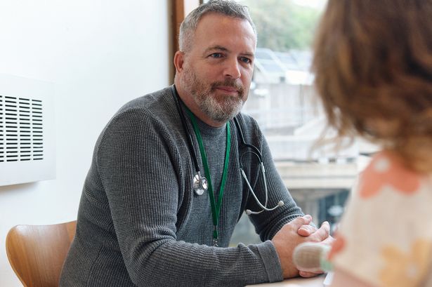 Healthcare Professional Consulting Patients