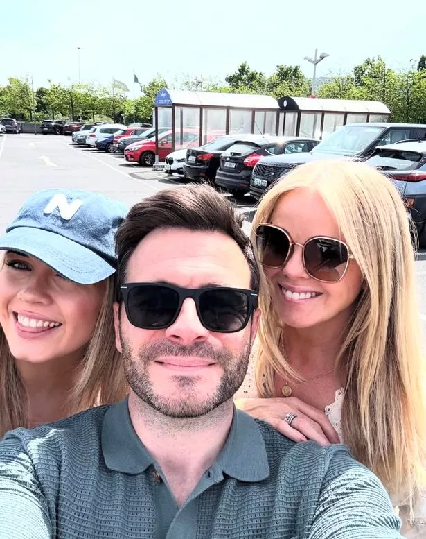 Shane Filan poses for a selfie with daughter Nicole and wife Gillian