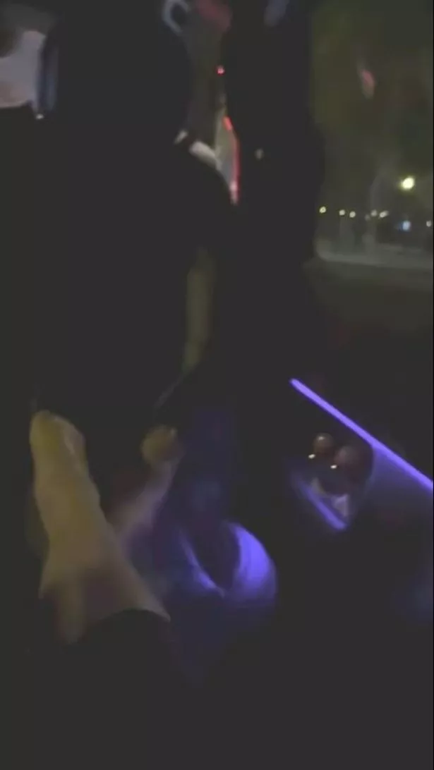 Meghan had her feet up in the back of the car