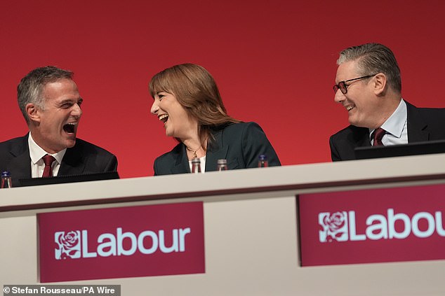 Business minister Peter Kyle (left) told crowds of Labour activists that he would implement the controversial package ¿in full¿