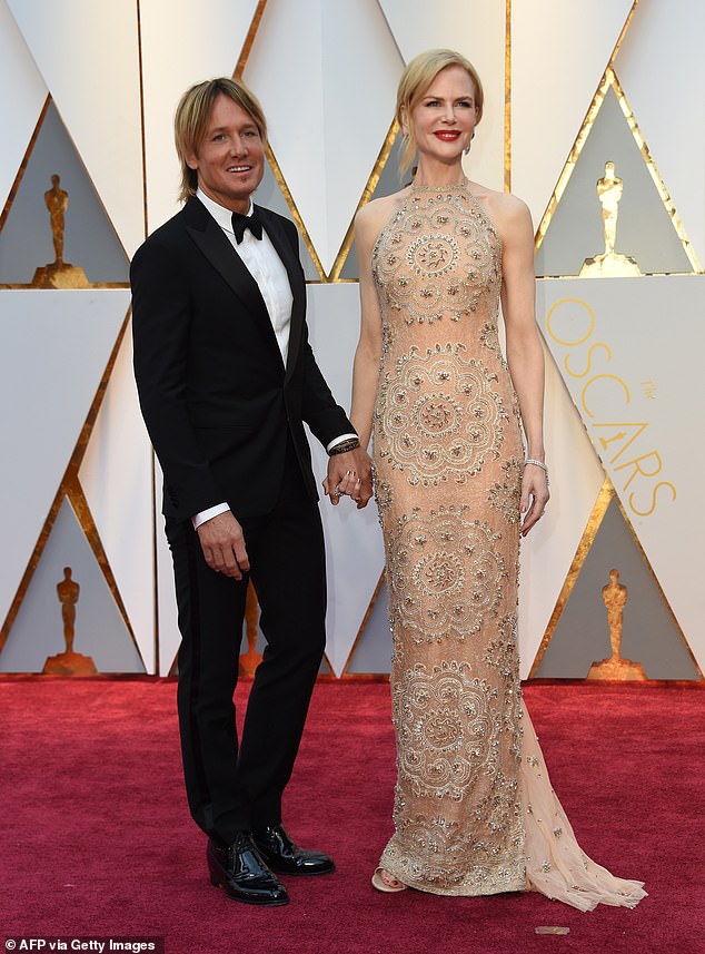 Despite the divorce, both stars will still 'provide a loving, stable, consistent and nurturing relationship with the children.' Keith and Nicole pictured in 2017