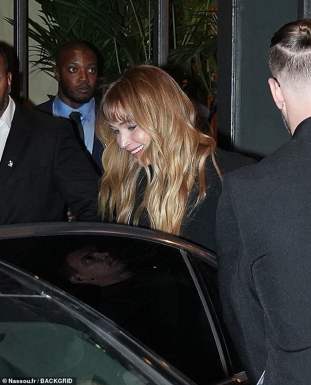 Jennifer couldn't wipe the smile off her face as she left the bash
