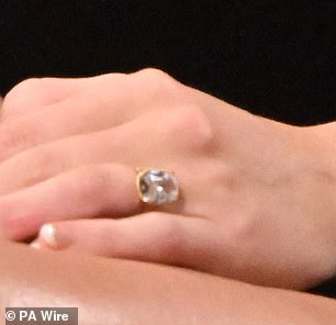 Her new engagement ring from Travis Kelce was front and centre, as Taylor showed off the sparkler