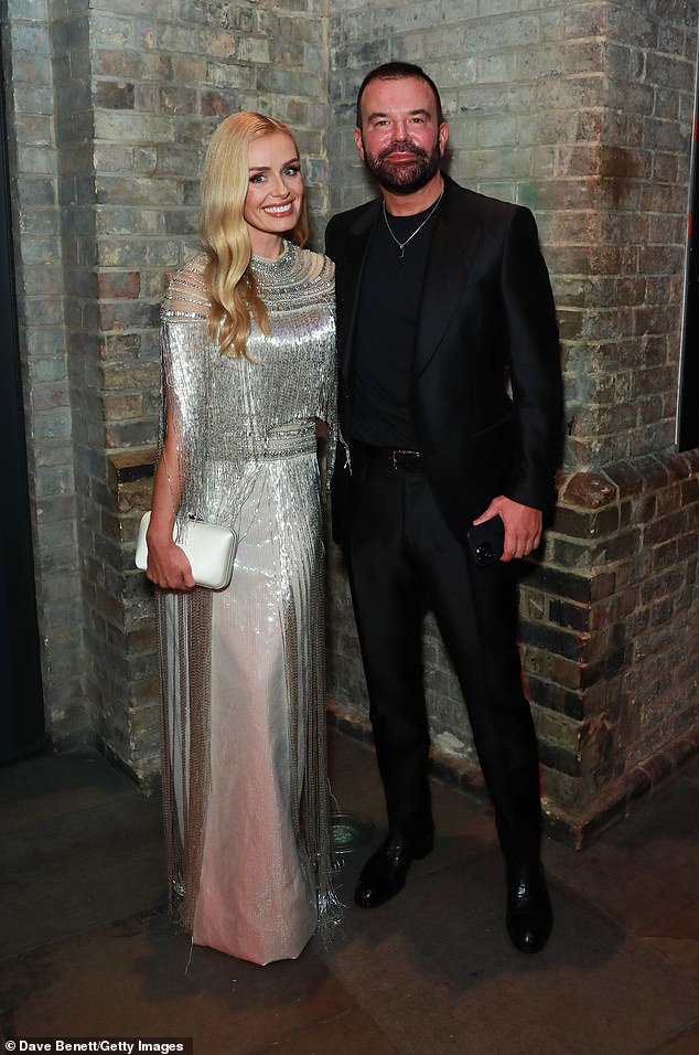 Katherine, who was joined by her husband Stuart Matchin, wore a 1920s-style silver fringed gown, featuring a sheer diamante and fringe top with a metallic skirt