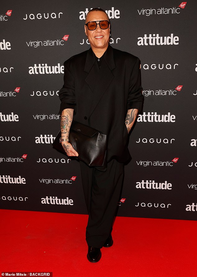 Meanwhile Gok Wan opted for an oversized black blazer complete with shoulder pads, and a leather handbag