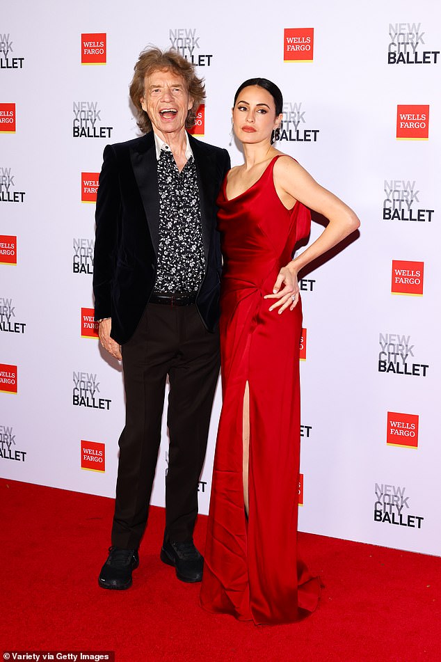 Hamrick — who, at 38, is Jagger's junior by more than four decades — lit up the event with her crimson gown