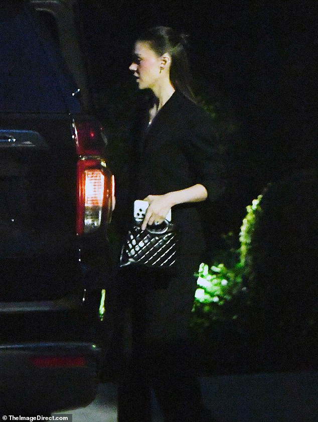 Nicola looked stunning in her business casual outfit, wearing her hair in a half up half down style
