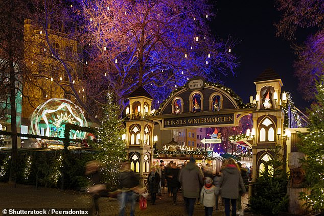 Cologne, situated just an hour and a half from the UK by plane, is home to several distinct and popular Christmas markets, each with a unique theme (Pictured: Alter Markt)