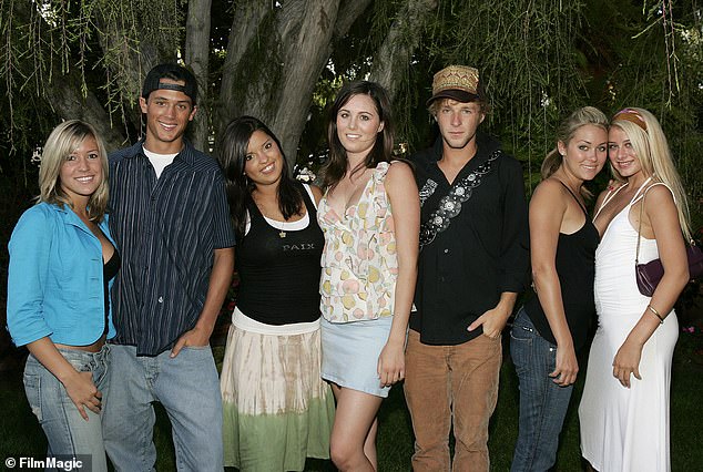 The women (seen with their costars in the early 2000s) were embroiled in one of the most famous feuds of the 2000s, but now, decades on, they have put the drama behind them