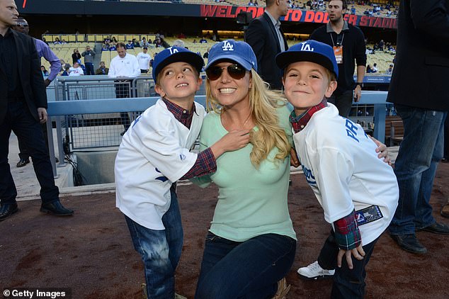 Federline claimed their sons Sean Preston, 19, and Jayden, 18, said they no longer wanted to visit their mother at her home during their teen years - citing fear as one of their reasons; Spears pictured with her sons in 2013