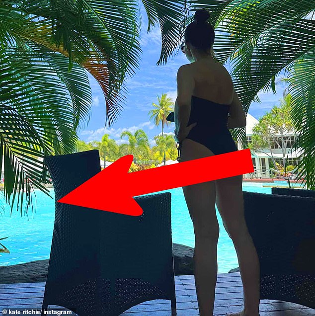 The former Home and Away star posted a photo of herself wearing a one-piece swimsuit while looking out over the deck of the Sheraton Mirage in Port Douglas, along with a large red arrow pointing to the pool