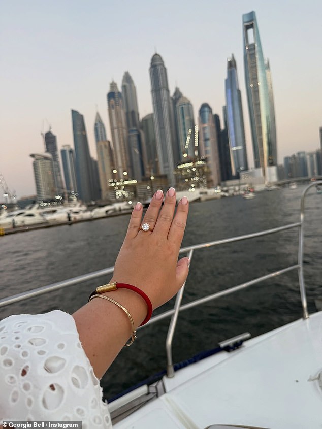 The pair then hugged, and steadied themselves on the rock boat, before Josh put the ring on Georgia's finger