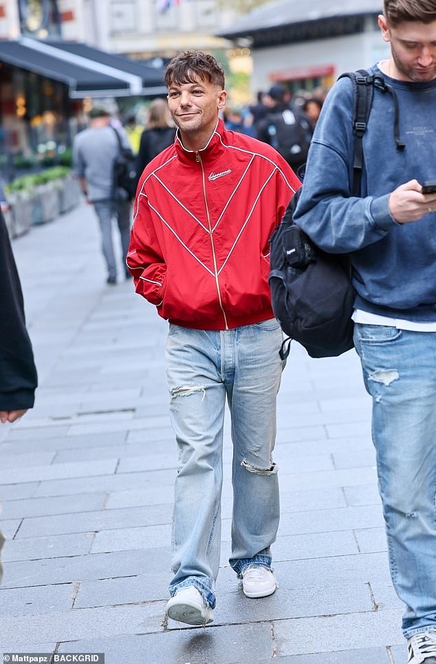 Louis was in high spirits as he arrived at Global Studios in London to promote his new album How Did I Get Here? which he's set to release in January 2026