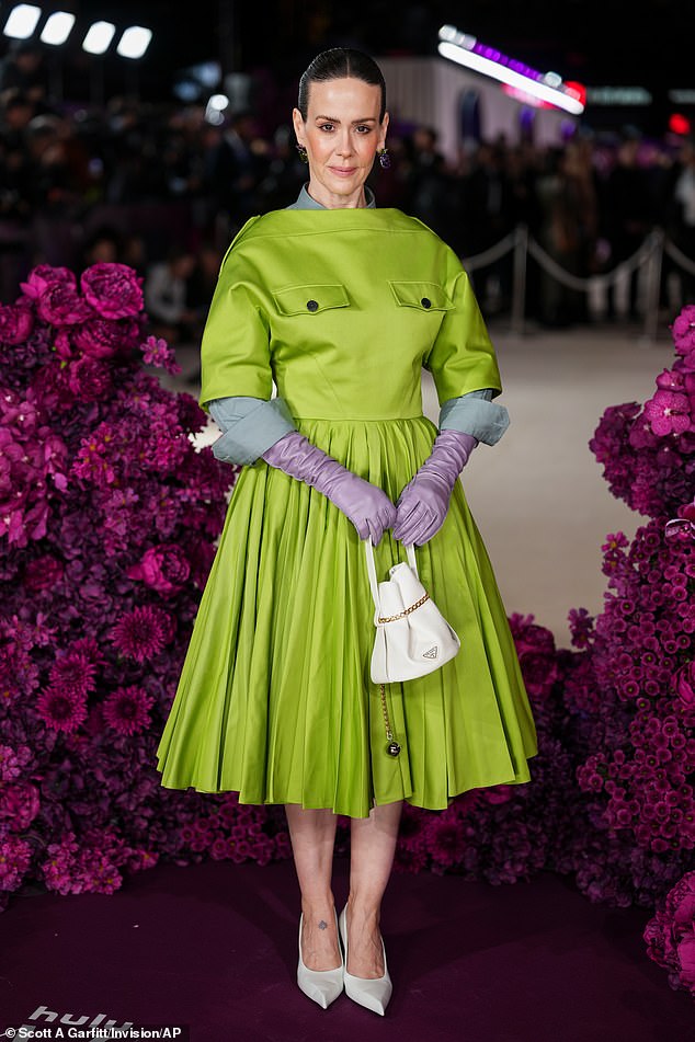 Sarah Paulson also ditched her sheer outfit for a 1960s-inspired green dress with an A-Line skirt and contrasting lilac gloves