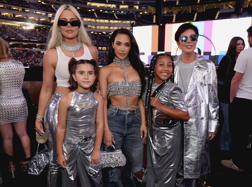 Khloe Kardashian, Kim Kardashian, Penelope Disick, North West, and Kris Jenner in metallic outfits at Beyonce's Renaissance concert