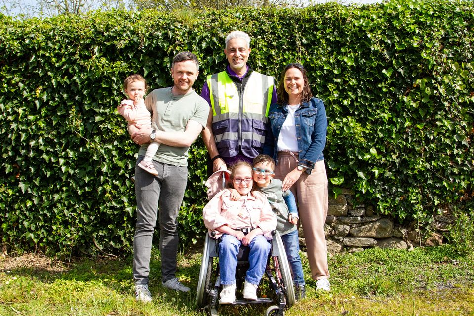 Baz Ashmawy with nine-year-old Aoibhínn and the rest of the O'Hanlon family in Mooncoin, Co Kilkenny. Photo: RTÉ