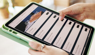 Photo: Hands, person and tablet screen for job search on website, vacancy listings and contact us of recruitment process. Digital, resume app and online for hiring service, application post and opportunity.
