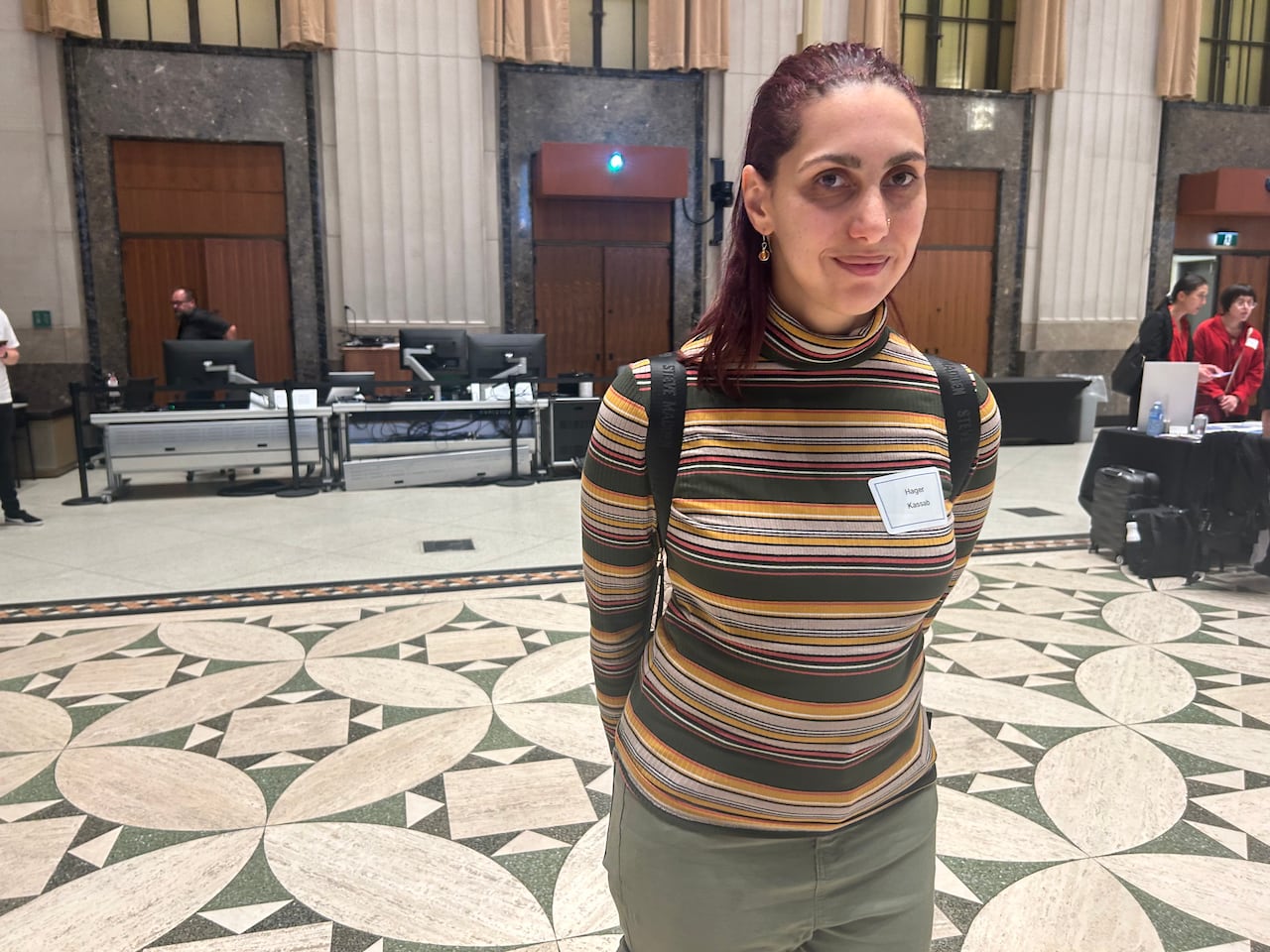 An attendee poses at a job fair.