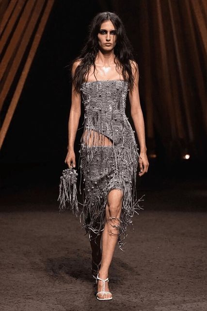 Seán McGirr’s woven chainmail dress for Alexander McQueen at Paris Fashion Week. Photo: Getty