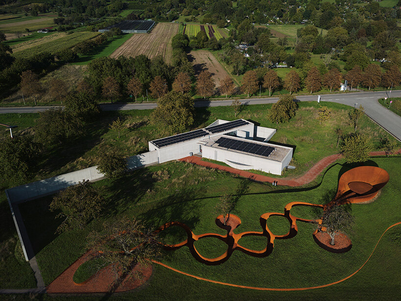 balkrishna doshi’s final project unfolds in spiraling steel forms on the vitra campus, germany